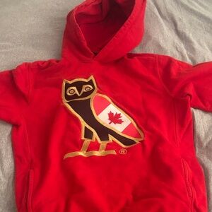 OVO Red Hoodie with Owl and Maple Leaf Design